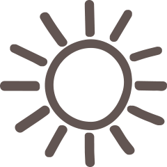Simple black sun icon with rays extending outward on a light background. - Hotel La Casies Mountain Living
